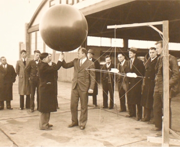 Carl-Gustaf Rossby, center, with a radiosonde in 1934. Photo courtesy of the MIT archives