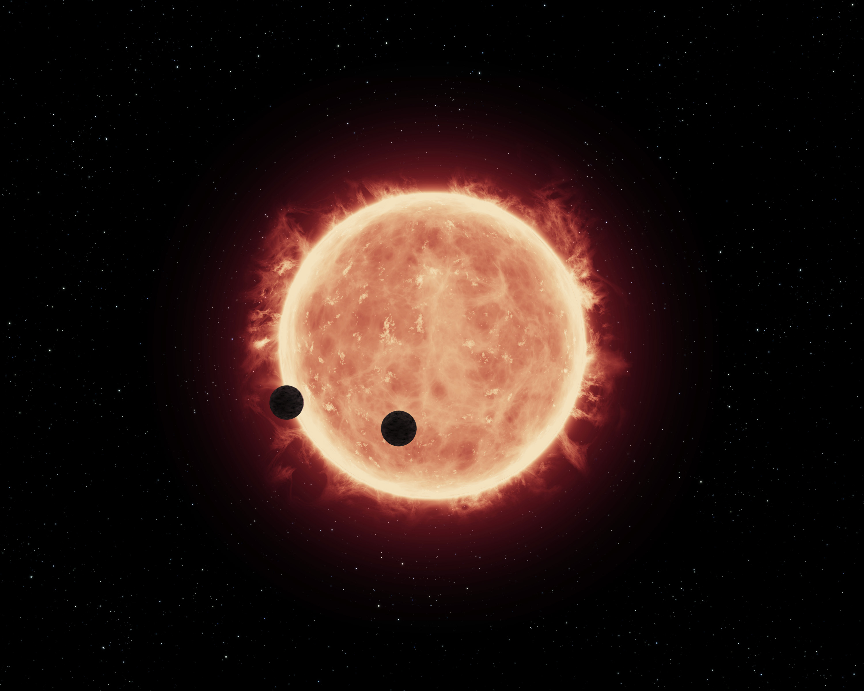 An artist’s depiction of planets transiting a red dwarf star in the TRAPPIST-1 System (Image: Courtesy of NASA/ESA/STScl)